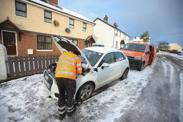 Car being repaired at road side